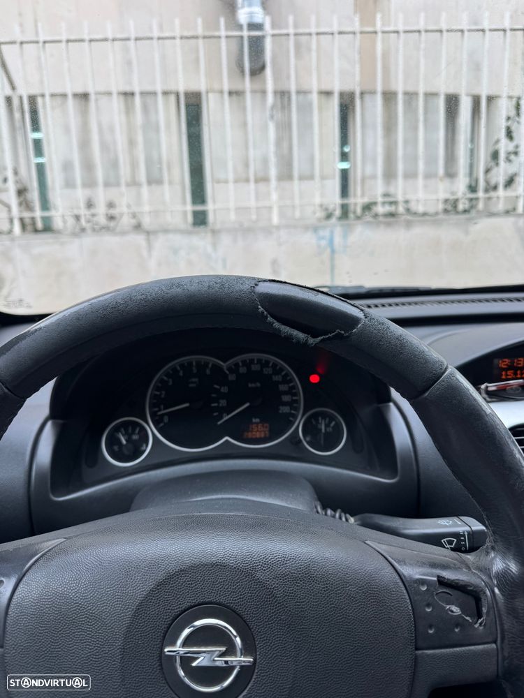 Opel Tigra TwinTop ver-1-3-cdti - 1