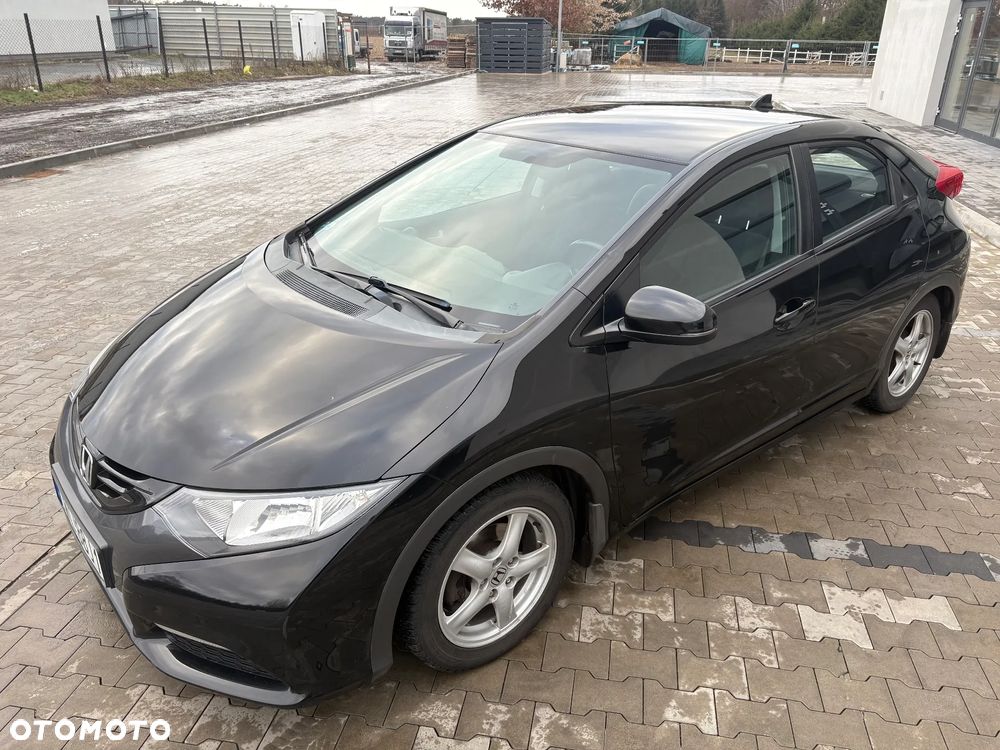Honda Civic 1.4 Comfort - 1