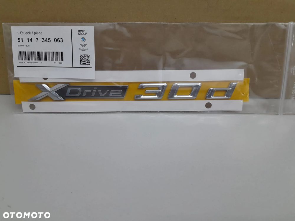 Emblemat BMW X Drive (nr 51147345063) - 1