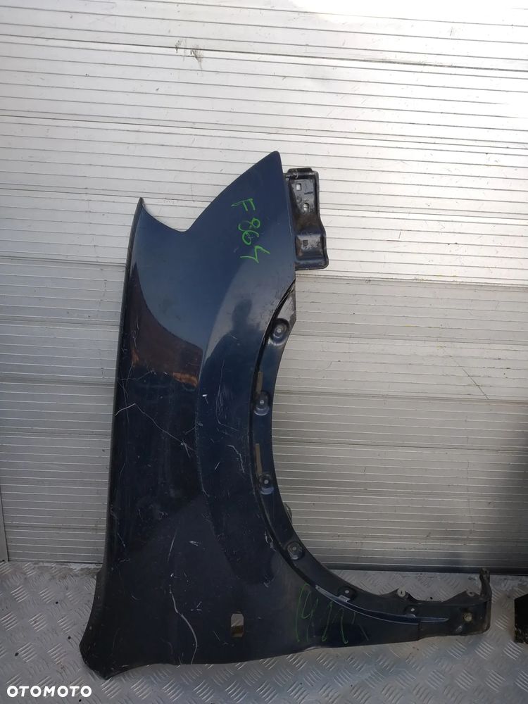 F697/F864 BŁOTNIK PRAWY NISSAN QASHQAI 2010 - 2014 - 4