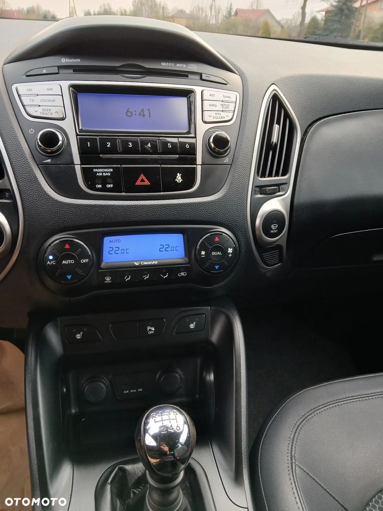 Hyundai ix35 1.7 CRDi 2WD blue Finale Gold - 14