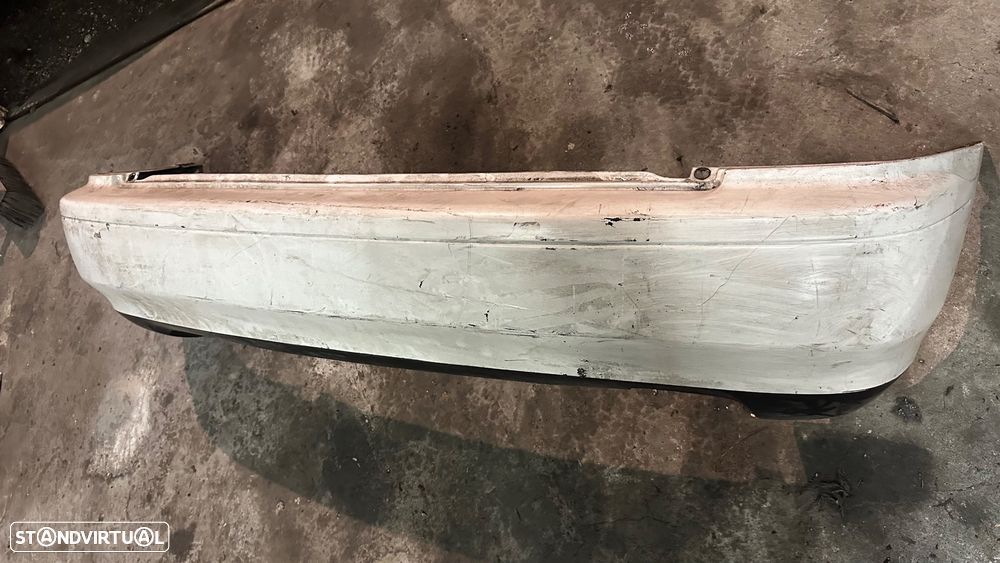 Parachoque Mazda 323 traz - 3