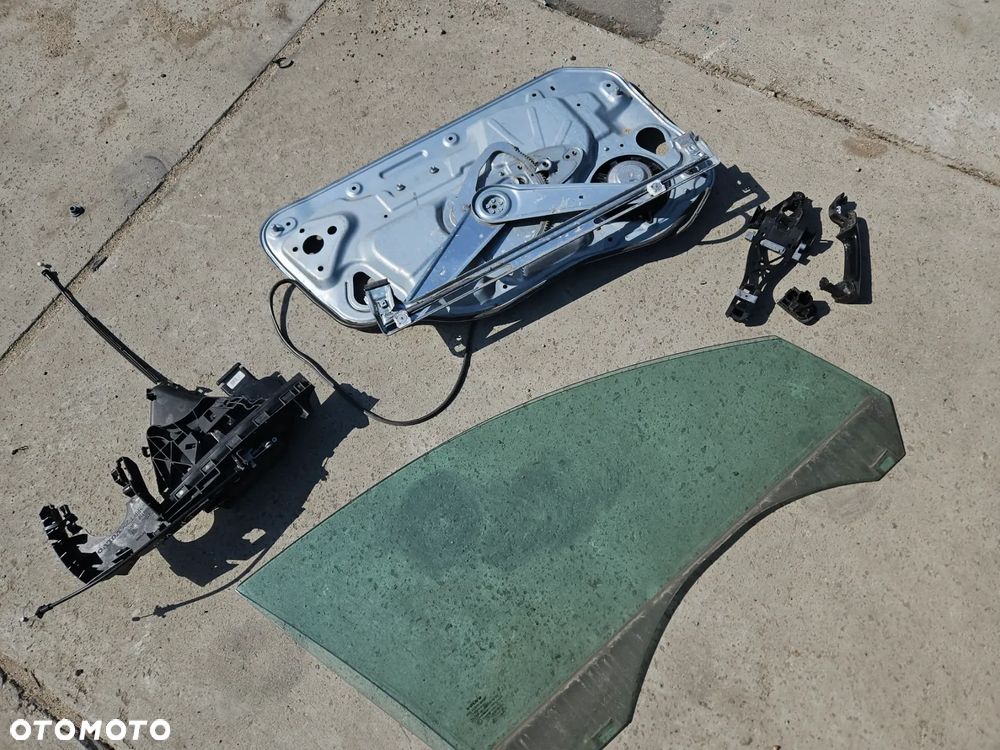 Zamek podnośnik klamka szyba drzwi prawy przedni Volvo V50 przedlift 2004r 452-46 - 1