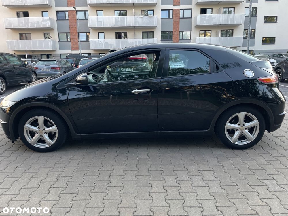 Honda Civic 1.8 Comfort - 14