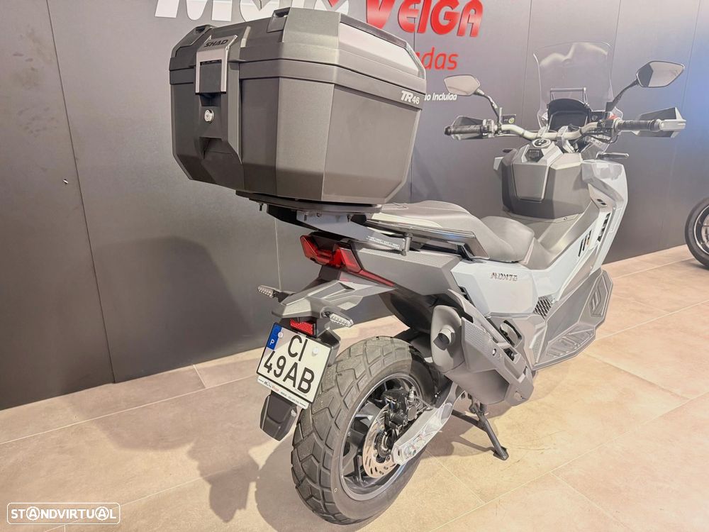Sym ADX - 11