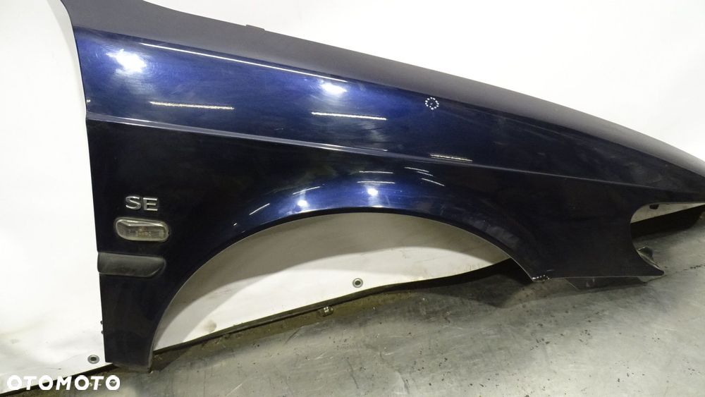 BŁOTNIK PRAWY PRZÓD SAAB 9-3 I 2.0 - 9