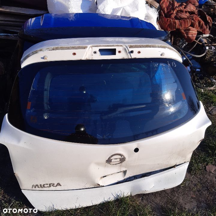 Szyba tylna Nissan K13 podgrzewana - 1