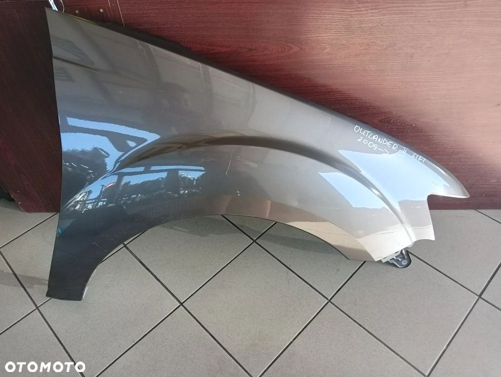 Mitsubishi Outlander II 2 lift PRAWY błotnik przedni - 1