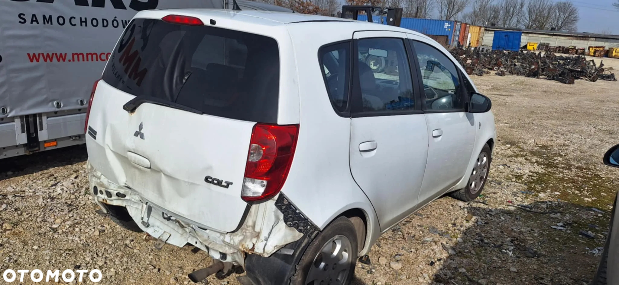 Mitsubishi COLT VI LIFT 1,1 75KM piasta zwrotnica lewy przód - 7