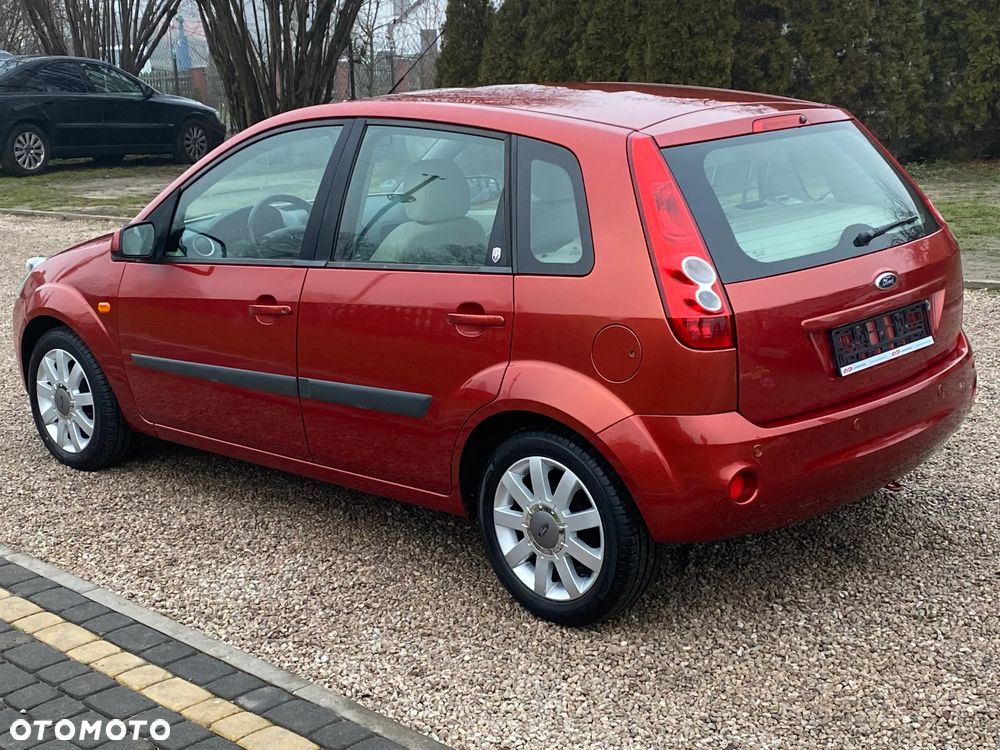 Ford Fiesta 1.4 Ghia - 4