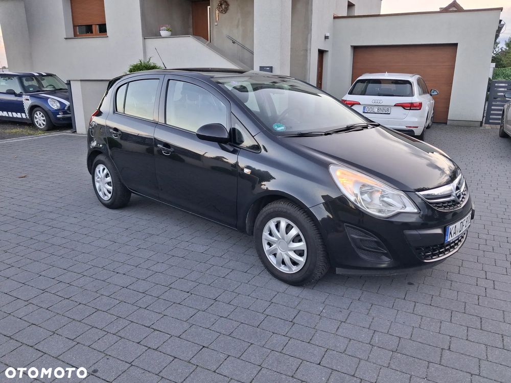 Opel Corsa 1.2 16V Cosmo - 6