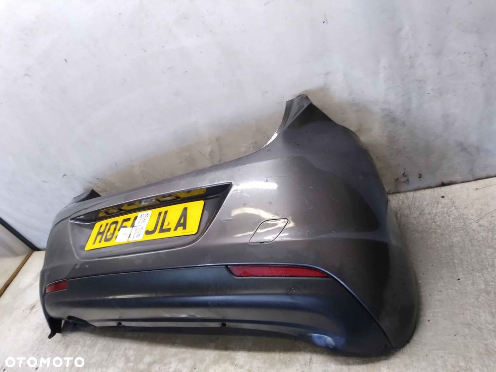 ^ ZDERZAK TYŁ TYLNY OPEL ASTRA J Z177 SZARY 5D 5 DRZWI HB - 2