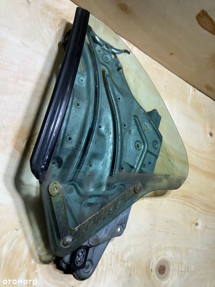 PODNOŚNIK SZYBY BMW E36 CABRIO TYŁ PRAWY LUB LEWY MECHANIZM SZYBY ELEKTRYCZNY SZYBA LEWA PRAWA KABRIO 8119985 8119986