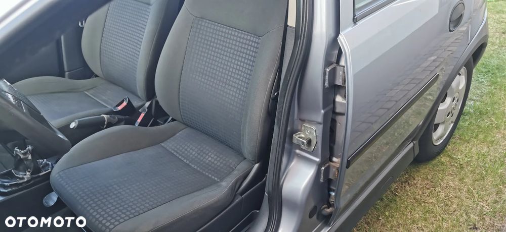 Opel Corsa 1.2 16V Enjoy - 9