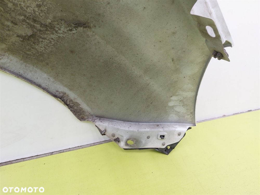 Błotnik przedni lewy OPEL CORSA D 2006-2014 10U / Z474 BIAŁY - 10