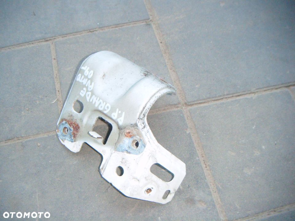 fiat grande punto 09r mocowanie błotnika prawy przód - 1