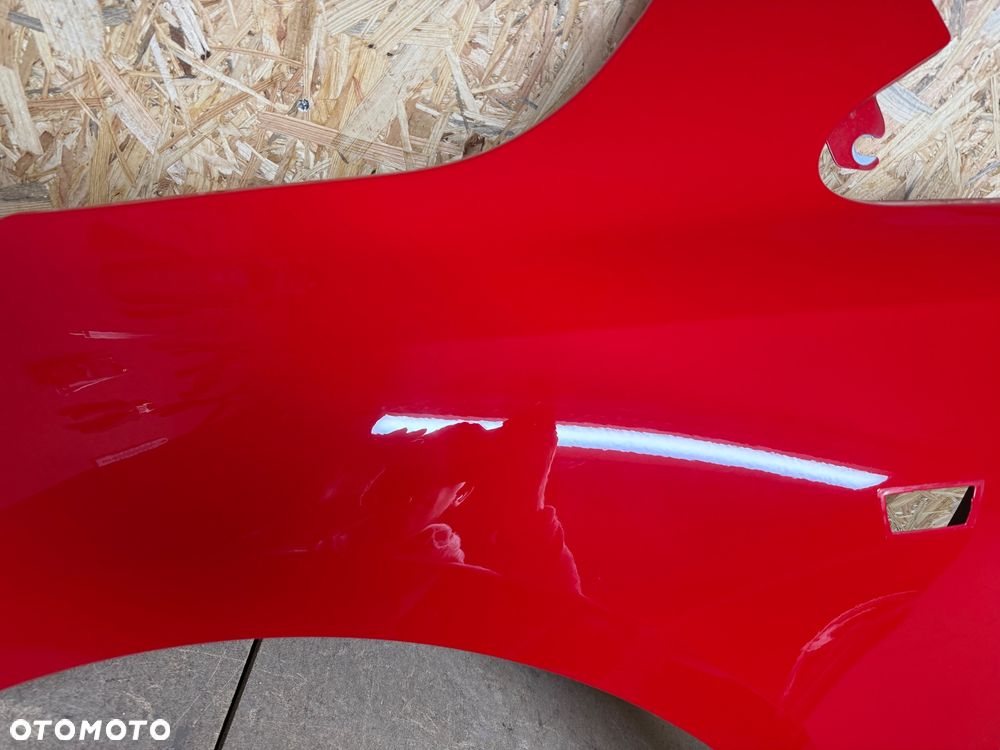 BŁOTNIK LEWY PRZÓD LEWY PRZEDNI OPEL CORSA E CZERWONY 50B - 14