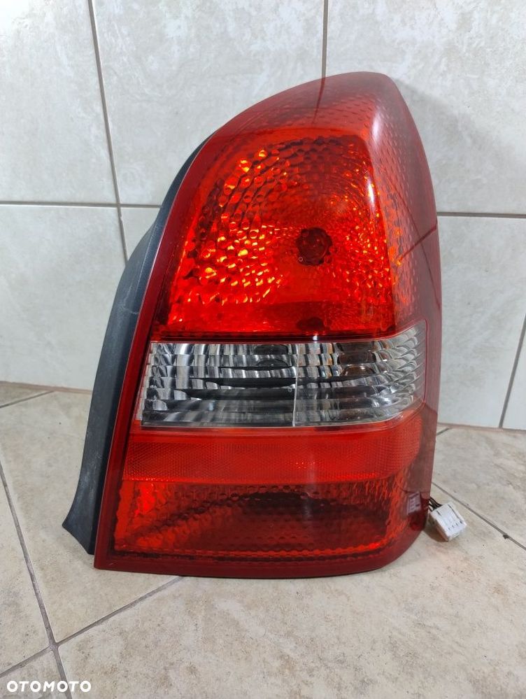 Nissan Primera P12 lift Lampa prawa tył sedan wersja Europejska wysyłka olx  pobranie kurier - 1