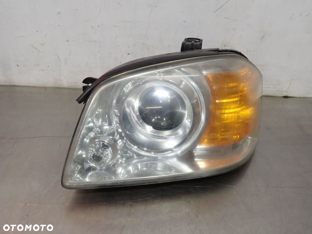 LAMPA LEWA PRZEDNIA KIA MAGENTIS I LIFT - 1
