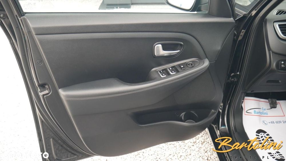 Kia Carens - 11
