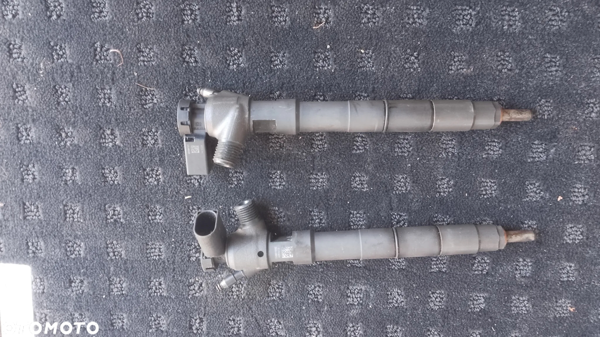 Wtryskiwacz 2.0 TDI 04L130277BA 28543147 VW T6 - 2