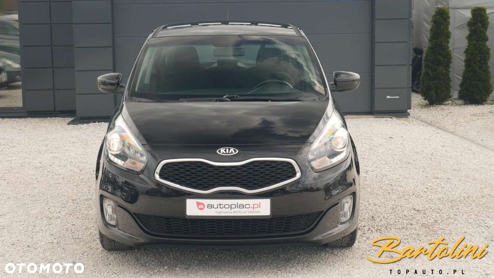 Kia Carens - 4