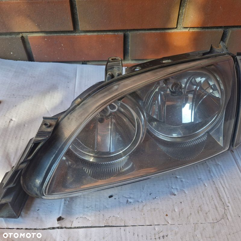 REFLEKTOR LEWY LAMPA PRZÓD EU 54534381 TOYOTA AVENSIS T22 LIFT 00-03 - 2