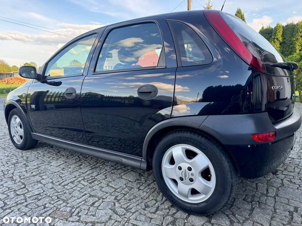 Opel Corsa 1.2 16V Enjoy Easytronic - 10