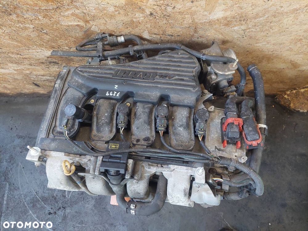 SILNIK BENZYNOWY SŁUPEK FIAT STILO I 1.6 16V 182B6000 - 5