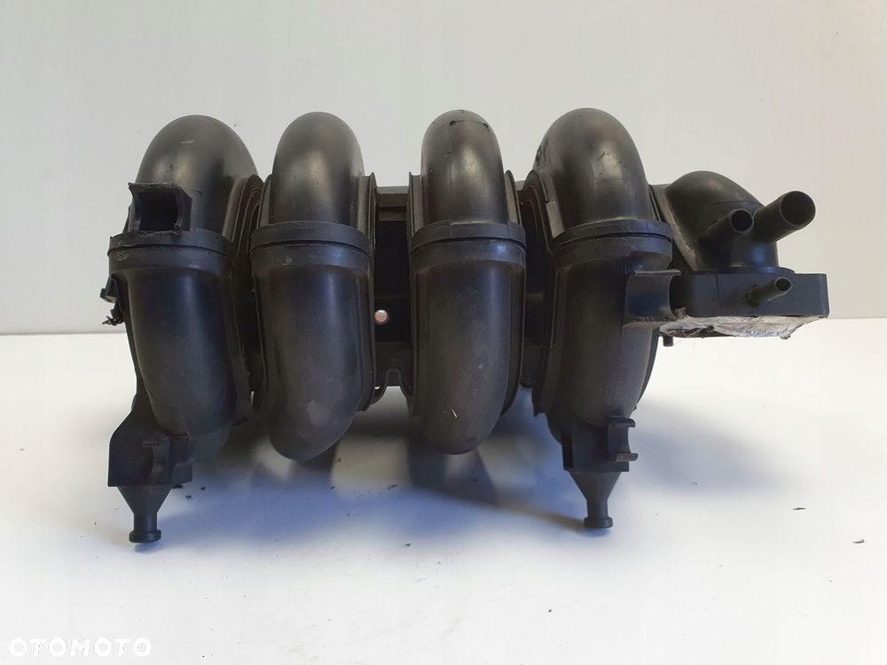 VW Fox 1.4 B KOLEKTOR SSĄCY 030129711CF - 4