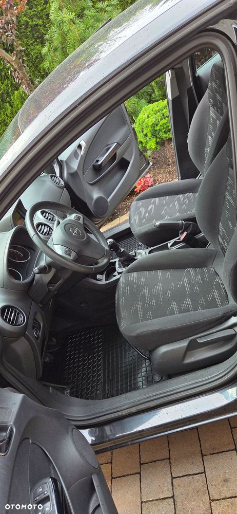 Opel Corsa 1.4 16V Enjoy - 12