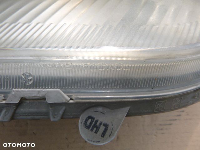 LAMPA LEWY PRZÓD LEWA PRZEDNIA TOYOTA COROLLA E12 01- - 11