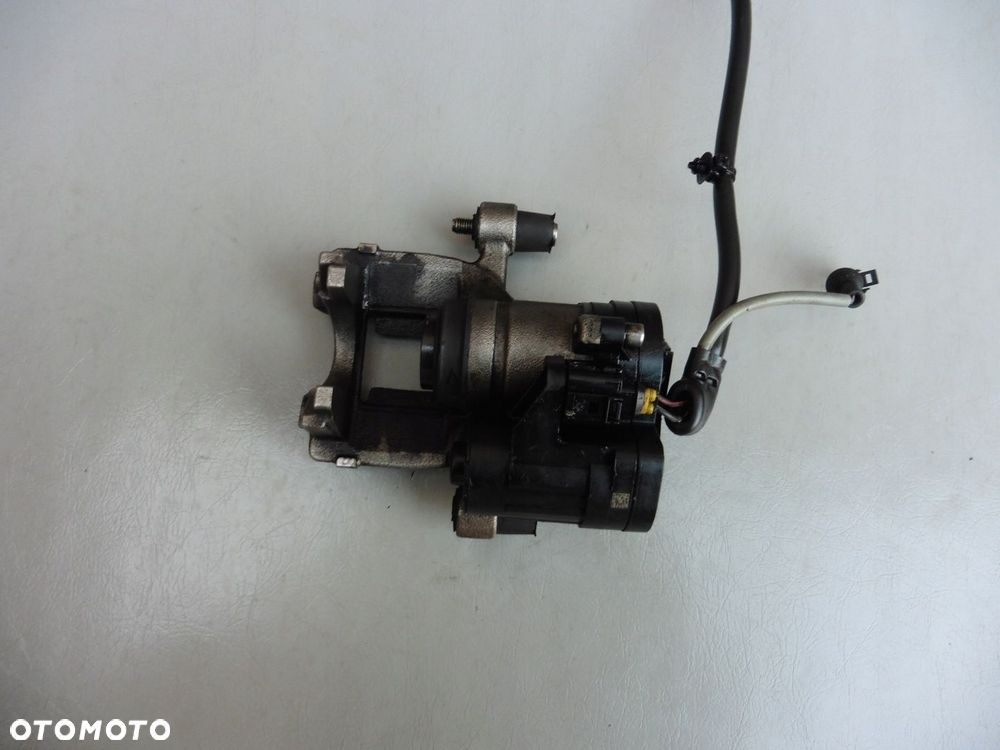 Zacisk hamulcowy prawy tył VW Golf VII Audi A3 8V T-Roc Audi Q2 - 5