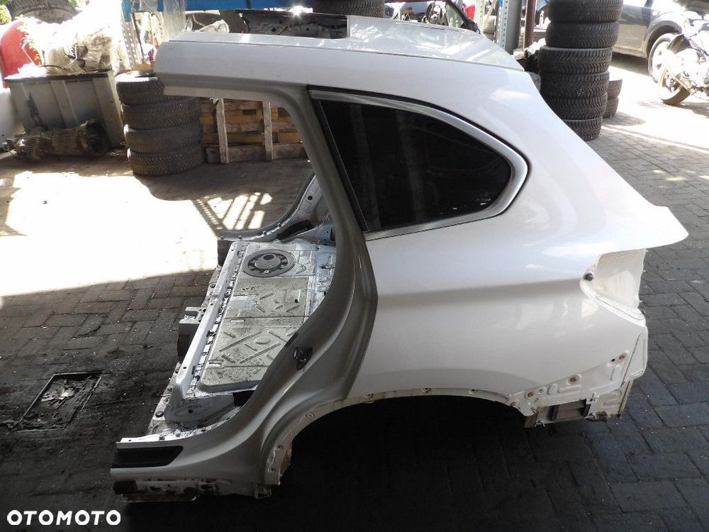 BMW X1 F48 BŁOTNIK TYŁ LEWY A96 - 1