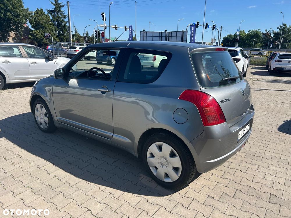 Suzuki Swift 1.3 Club - 9