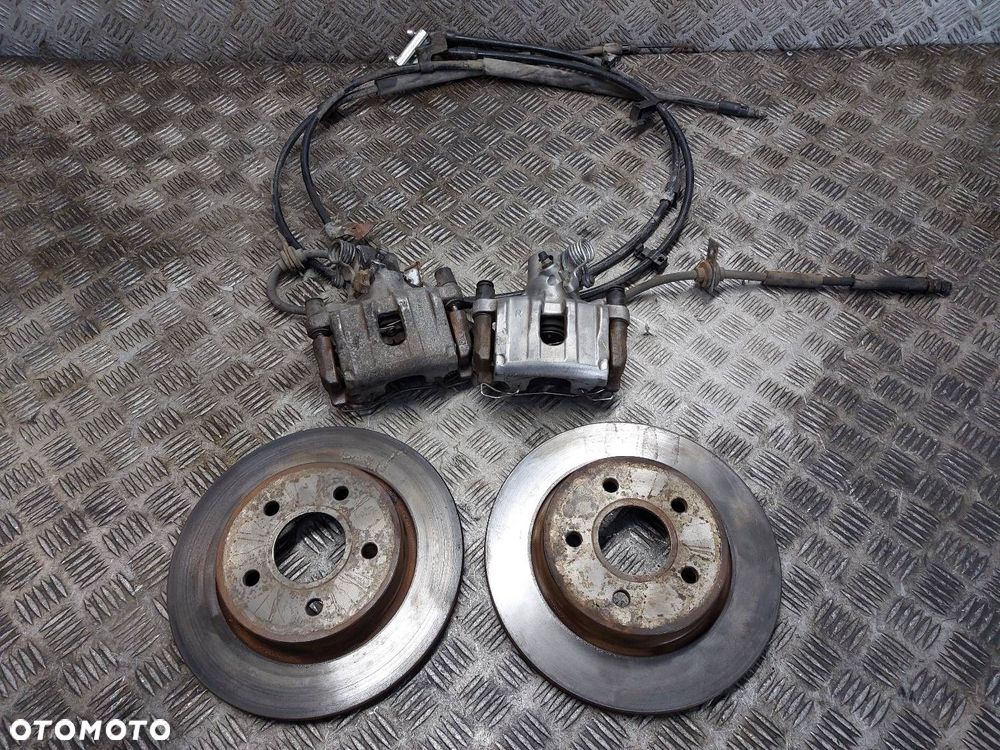 TARCZE HAMULCOWE TYŁ + KLOCKI + ZACISKI FORD FOCUS MK3 - 1