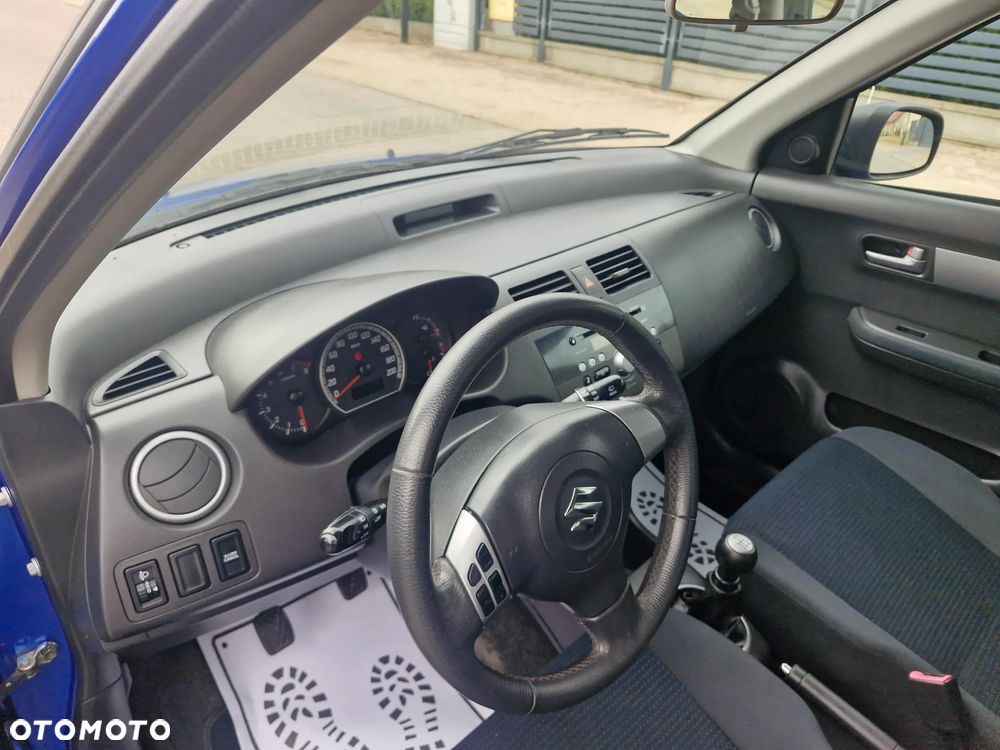 Suzuki Swift 1.3 Sakura - 27