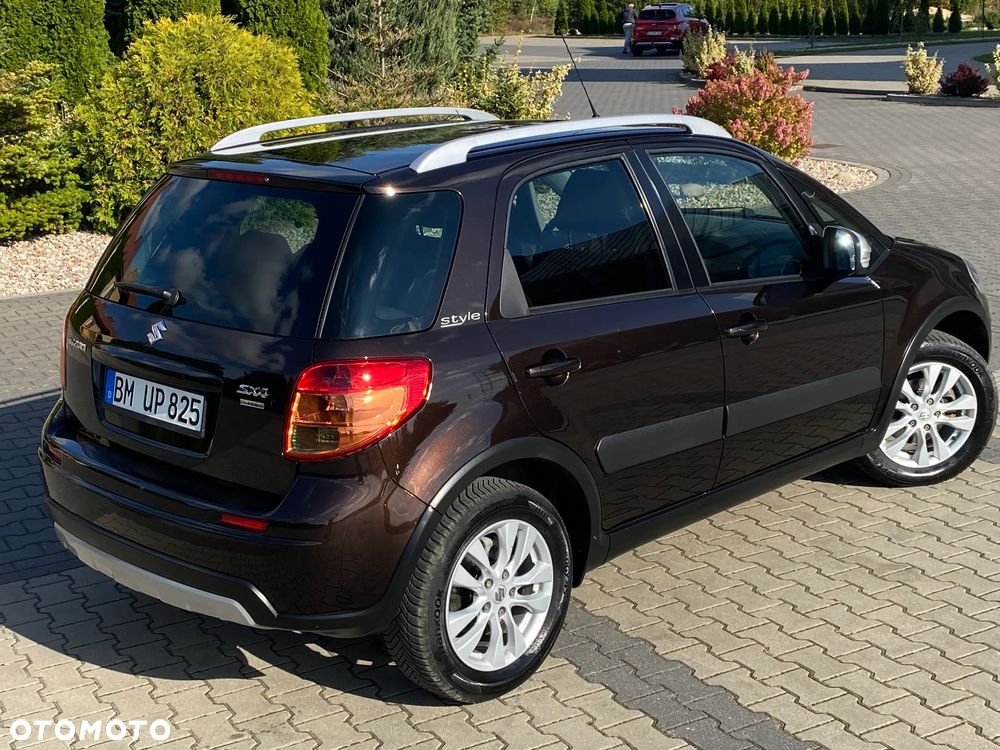 Suzuki SX4 1.6 Comfort Plus - 11