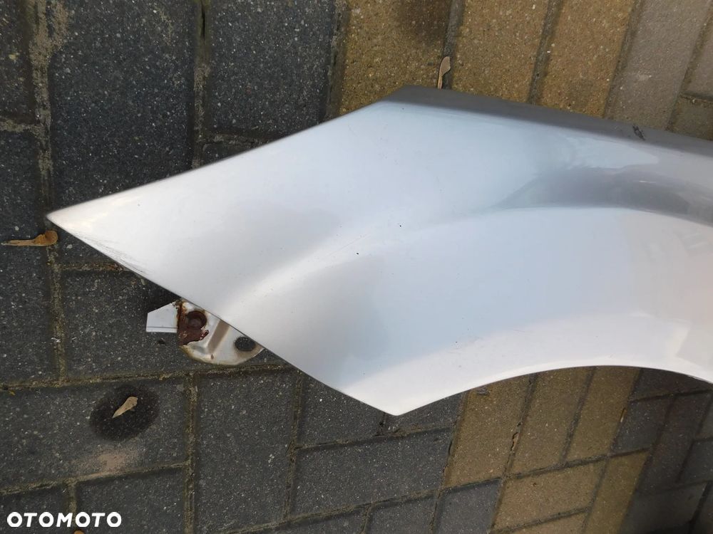 błotnik lewy przód FORD FOCUS II LIFT FL  03 - 2