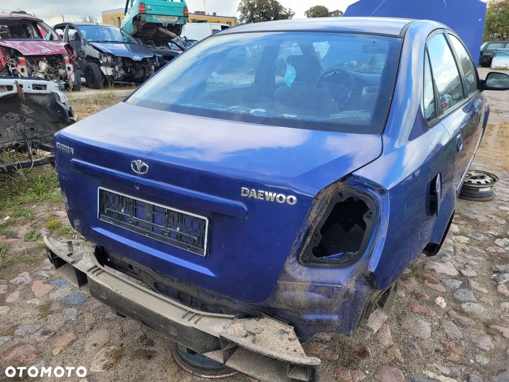 Klapa tylna bagażnika Daewoo Nubira 1,8 b 2004r 26V sedan - 2