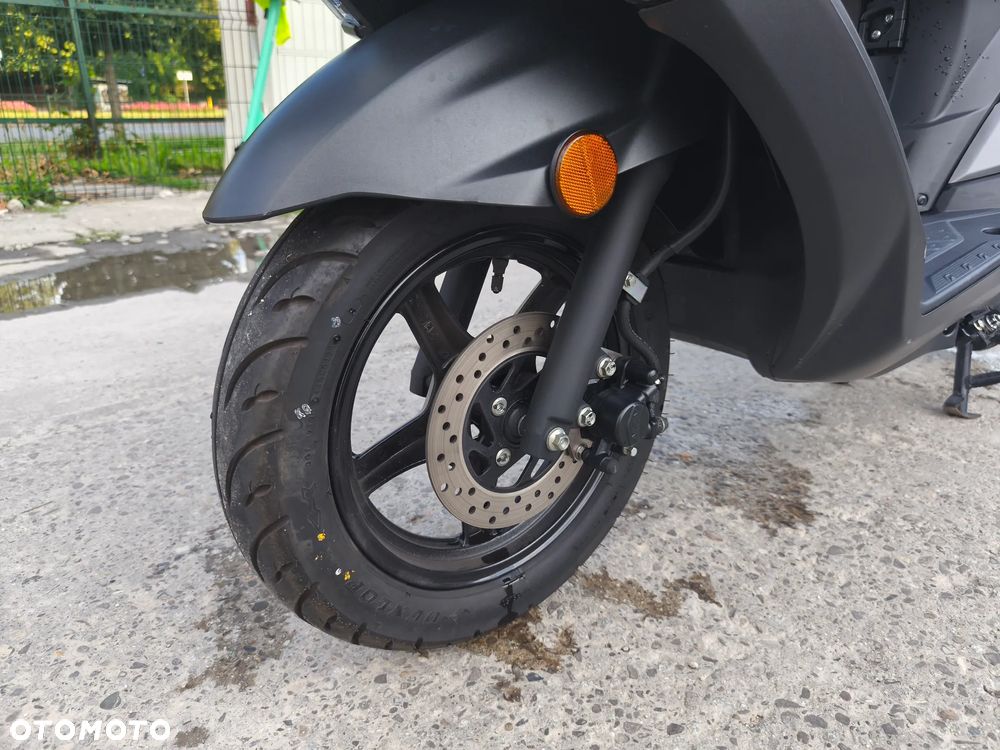 Suzuki Burgman - 7