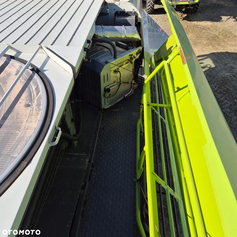 Claas Lexion 770TT z hederem - 31