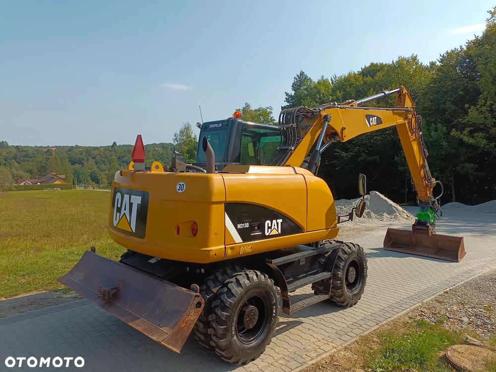 Caterpillar M313D - 1