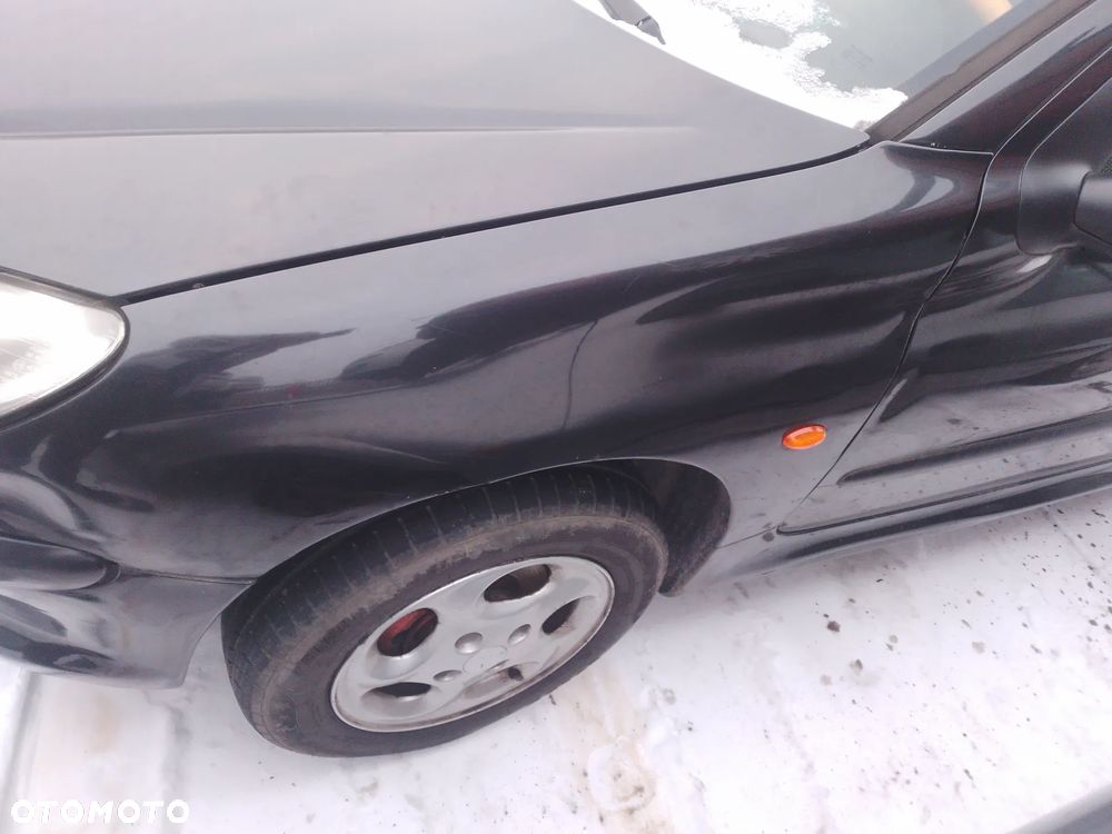 PEUGEOT 206  1.4 HDi 70 (DV4TD)- LAMPA TYŁ PRAWA LEWA - 12