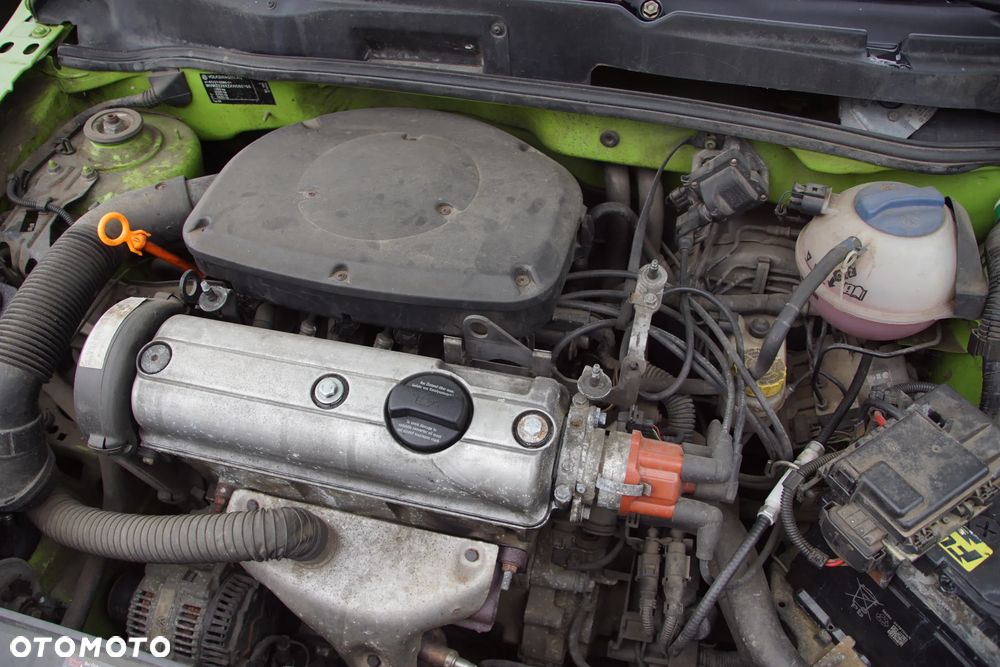 Auto na części - Volkswagen Lupo 1.0 MPI 50 KM ALL DKG LR6A 1998R Silnik Skrzynia Drzwi Maska Błotnik Zderzak Klapa Lampa Lusterko Klamka Szyba Deska Kokpit Sterownik Moduł Czujnik Licznik Panel Kierownica - 16