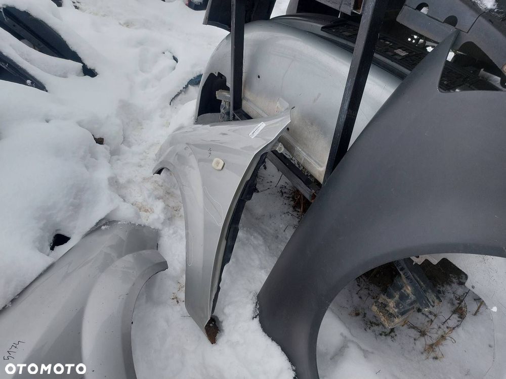 BŁOTNIK LEWY PRZÓD DAEWOO NUBIRA II J200 92U - 9