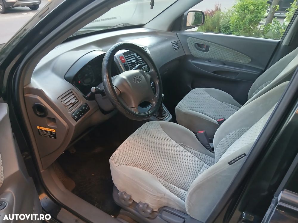Hyundai Tucson 2.0 CRDI VGT 4WD GLS - 7