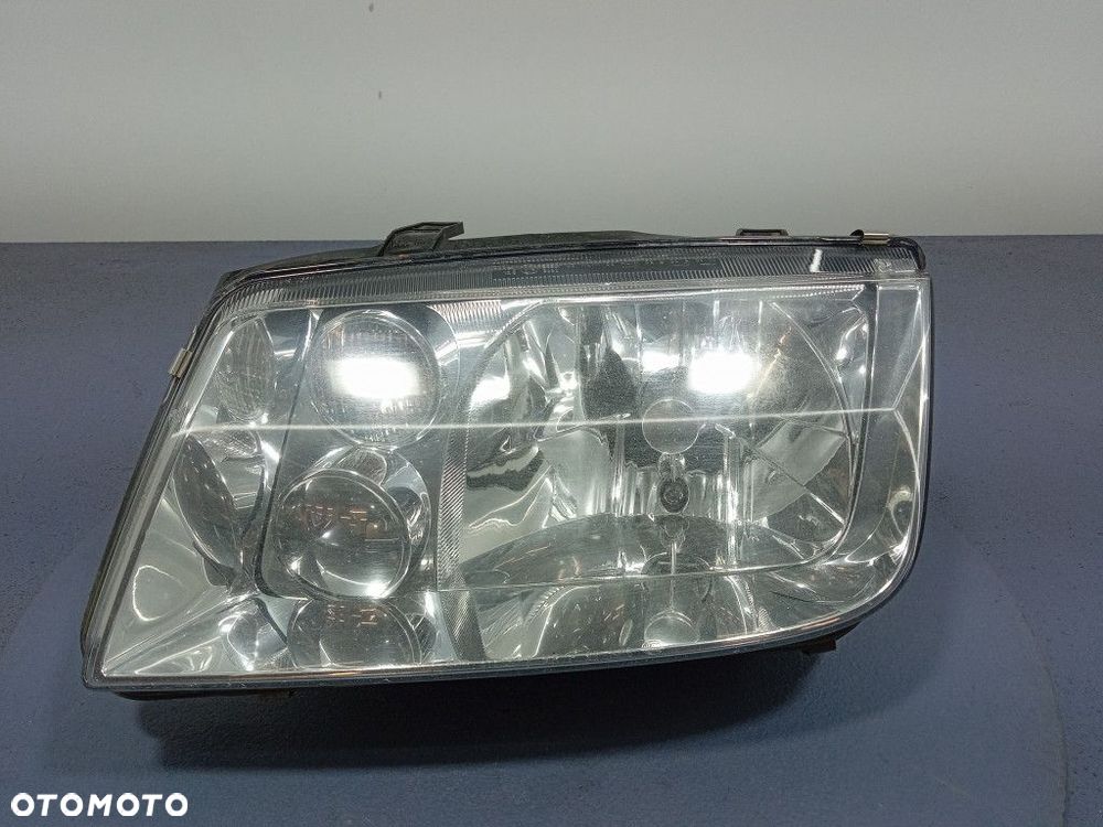 VW BORA REFLEKTOR LEWY LAMPA H7 EU 1EH963560 - 1