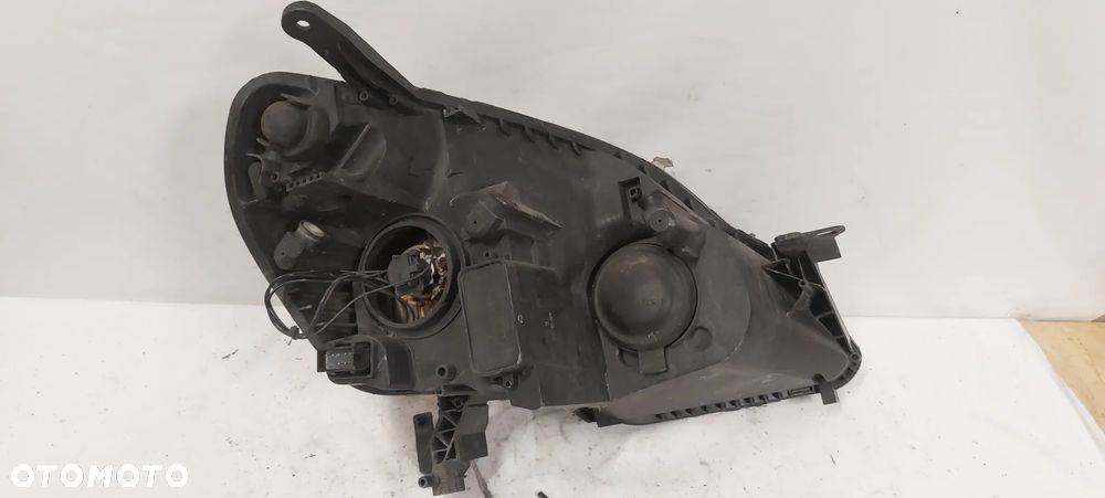 .  LAMPA PRZOD PRZEDNIA LEWA OPEL ZAFIRA B - 2