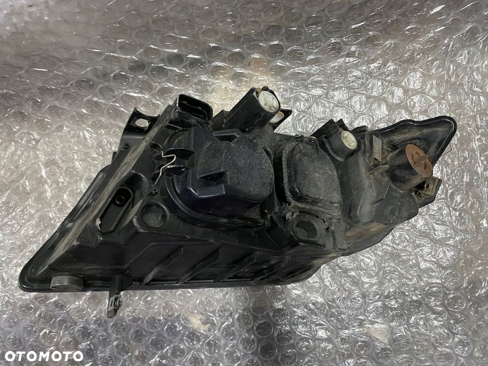 LAMPA PRAWA ZWYKŁA H7 BMW E90 USA 6942726-07 - 8